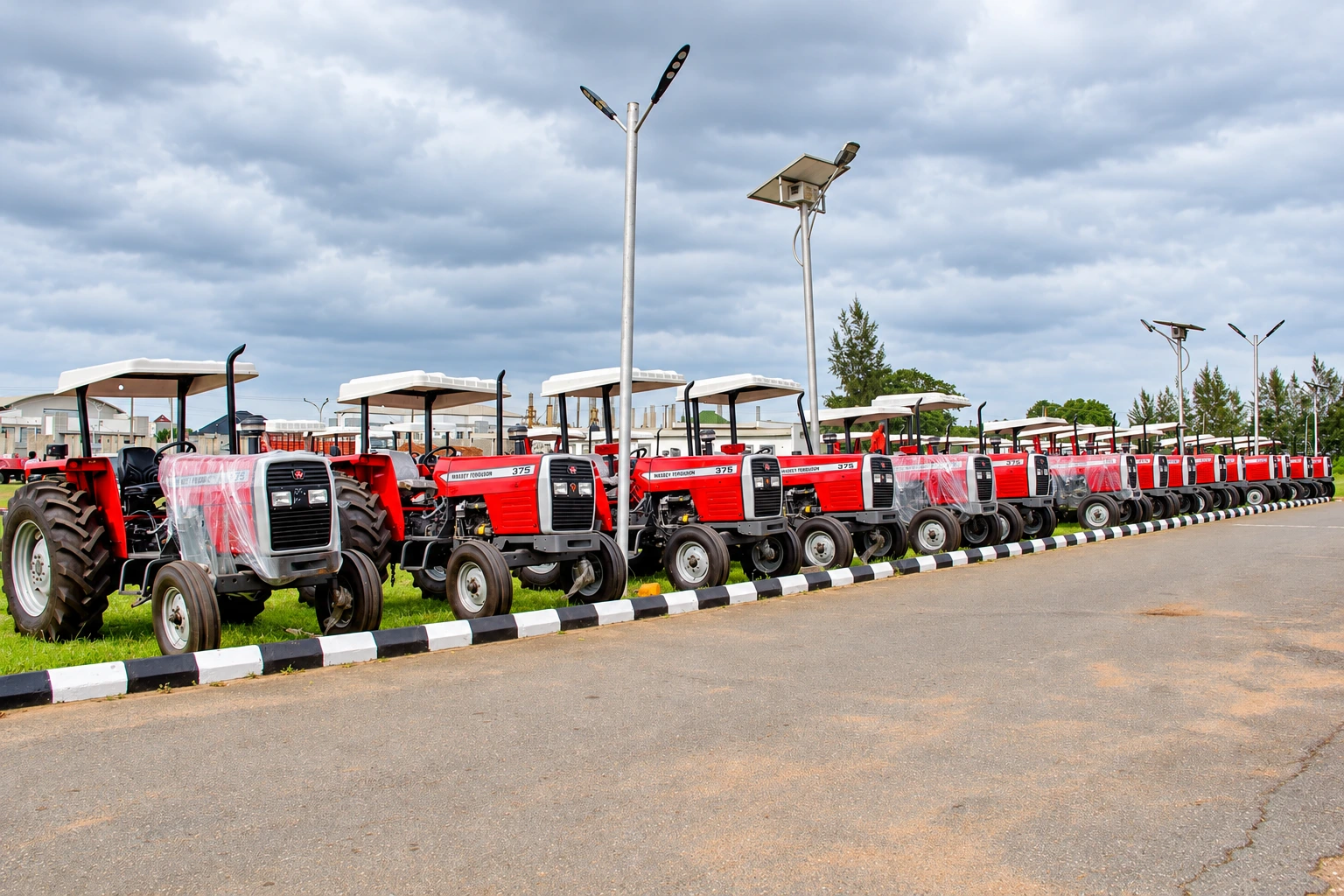 Enhanced photograph of a lineup of red agricultural tractors